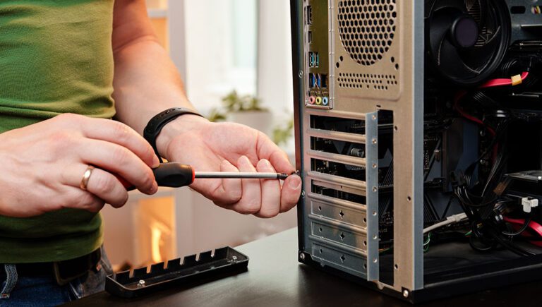 A person assembling or upgrading a desktop compute