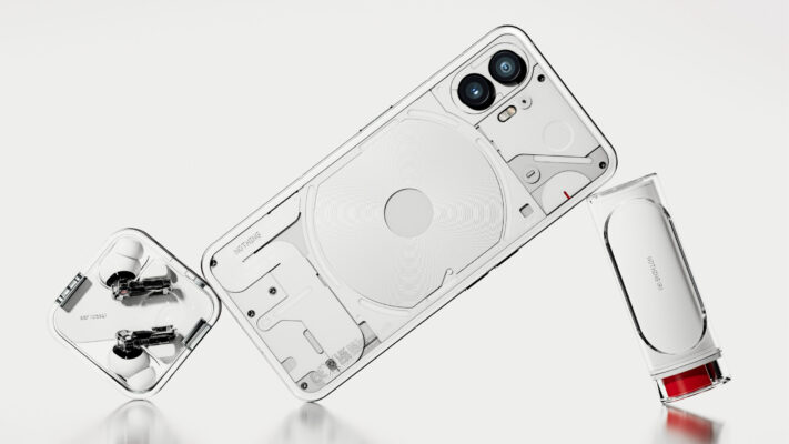 Nothing Phone (2) with transparent back design displayed alongside Nothing Ear (2) wireless earbuds and a sleek CMF accessory, showcasing the brand’s signature minimalist and futuristic aesthetic