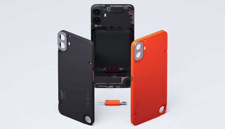 A CMF Phone 1 is shown disassembled, revealing its internal components including the battery, against a light grey background. Two interchangeable back panels, one in matte black and one in bright orange, stand upright on either side of the phone, showcasing their design with visible screws and camera cutouts. A small orange tool is in the foreground.