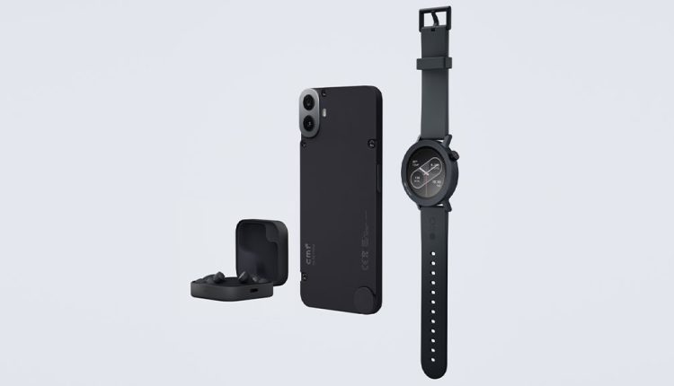 A set of black CMF by Nothing tech products against a light grey background. From left to right: an open black CMF Buds Pro 2 charging case with earbuds, a black CMF Phone 1 with its back visible, and a black CMF Watch Pro 2 with a matching strap.