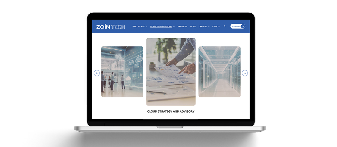 **Alt text (English):** A laptop screen displaying the ZainTECH website, featuring their "Cloud Strategy and Advisory" service. The website shows a carousel with three main images: a team discussing cloud infrastructure with digital overlays, a hand pointing to charts and diagrams on paper, and a corridor of server racks in a data center. The top navigation bar includes menu options like "Who We Are," "Services & Solutions," "Partners," "News," "Careers," "Events," and a "Get in Touch" button. The branding "ZAIN TECH" is prominently visible in the top left corner.