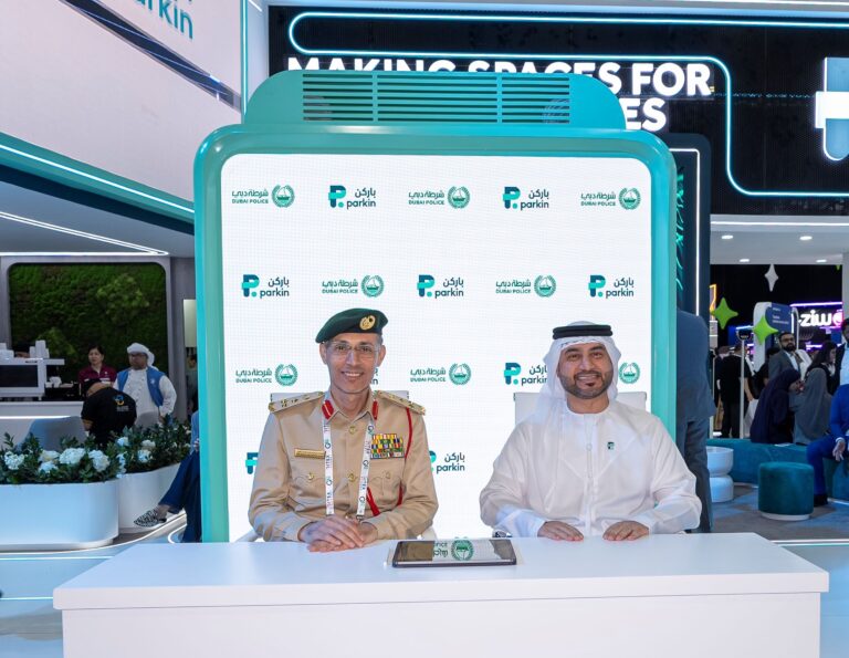 Brigadier Issam Ibrahim Al Awar, Acting Director of the General Department of Traffic at Dubai Police [left], and Mohamed Abdullah Al Ali, CEO of Parkin.